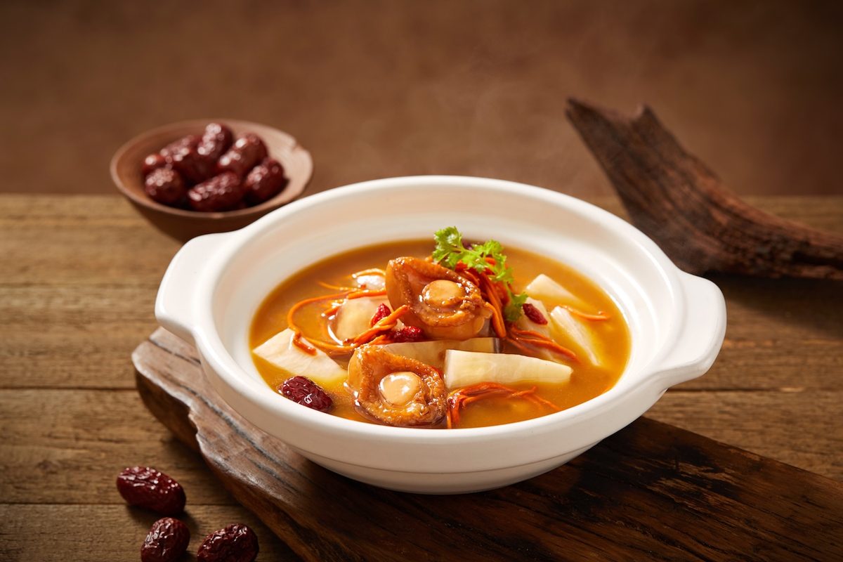 Premier Fish Maw and Abalone Soup, whole abalone and fish maw in a white claypot